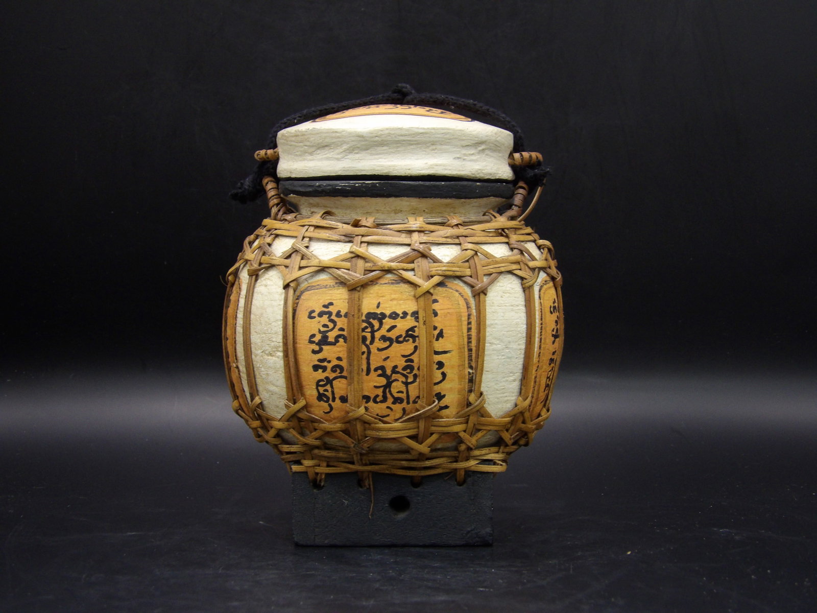 Asian Rice Basket With Lid and Rope Handle Beige: Beige background color with calligraphy. Probably Thai. 5.3 inches height.