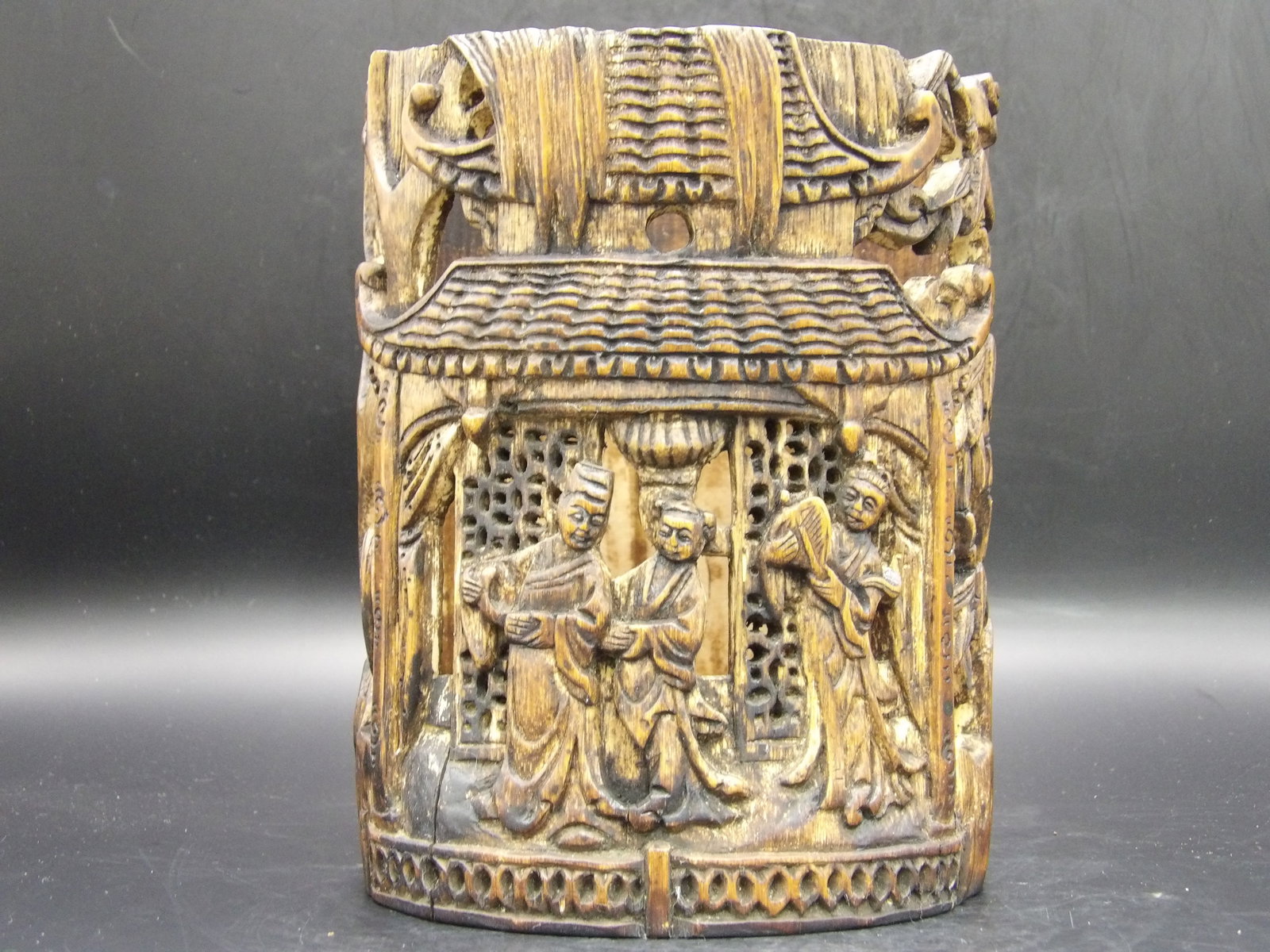 Antique Chinese Brush Hold Women Carving: Qing dynasty carved bamboo brush holder with 3 women in front of a big house.Natural old bamboo crack lines. Size is 5 x 4.8 x 6.3 inches.