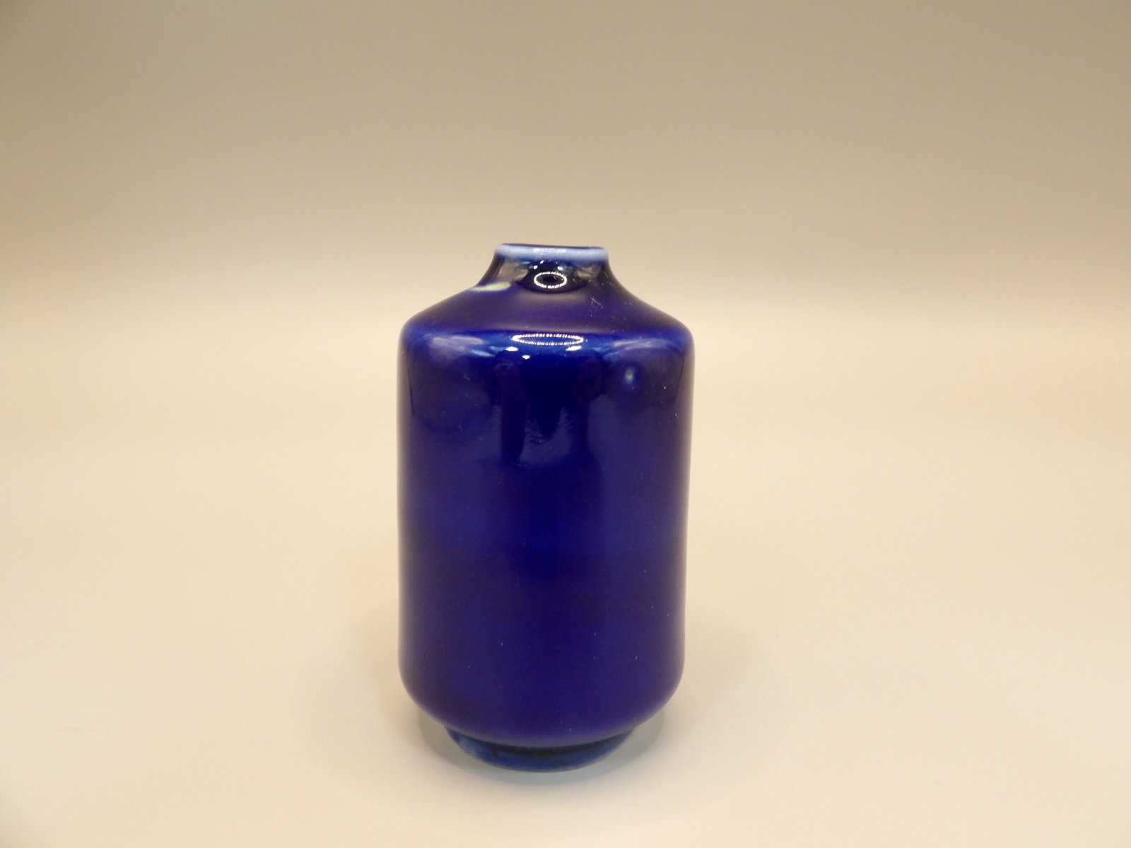 Chinese porcelain cobalt blue snuff bottle: 2.3 inches height. White color near bottle opening is glaze imperfection, not chip.