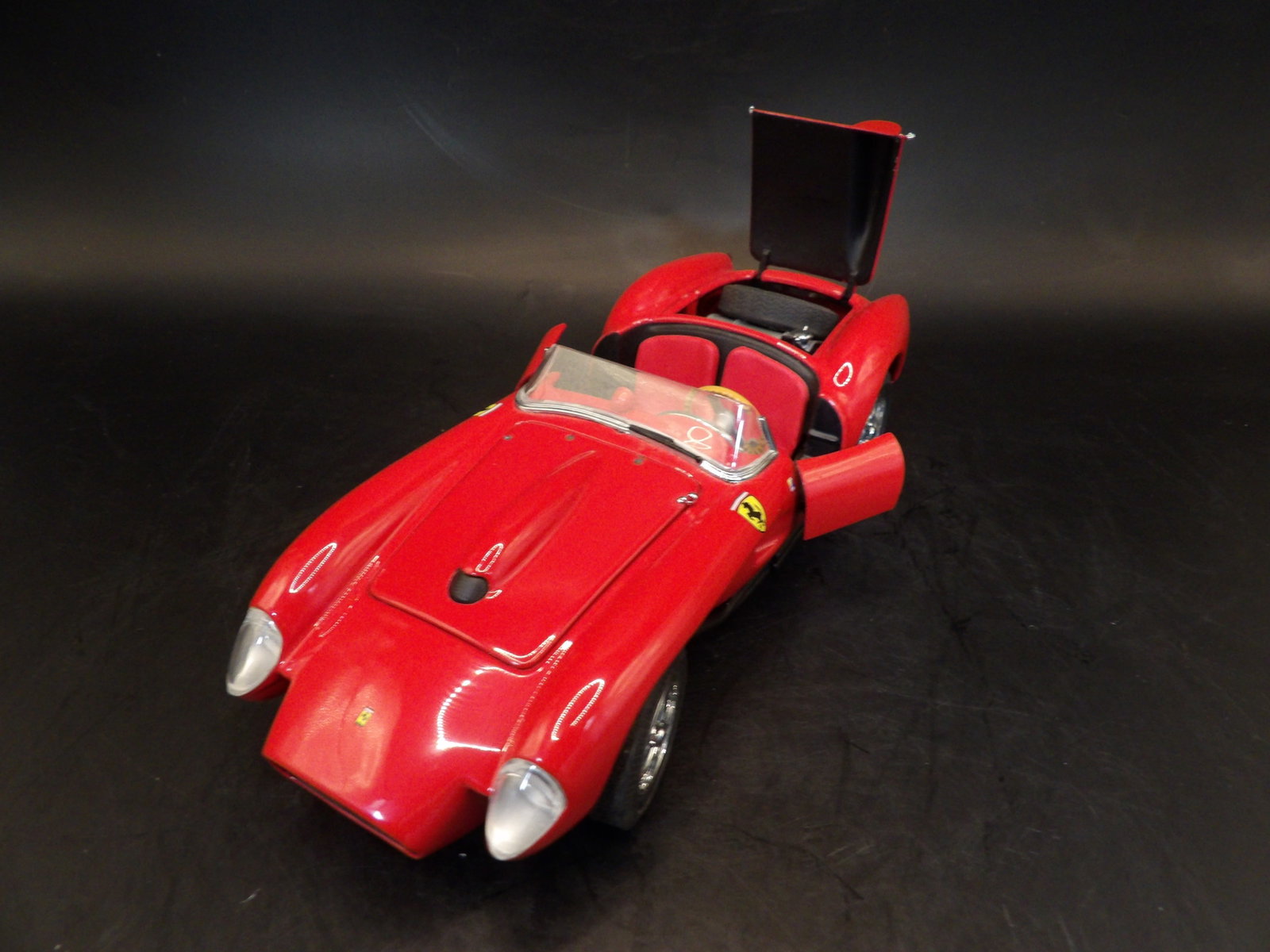 1958 Ferrari: 7 inches length. With spare tire inside back trunk.