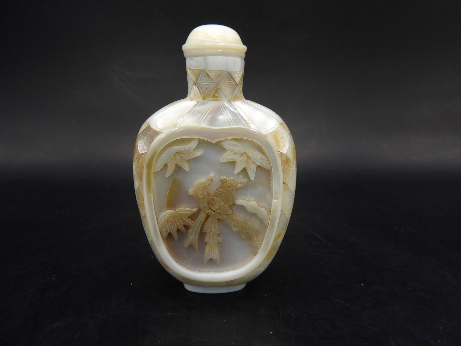 Chinese antique mother of pearl snuff bottle with bird tree flower motif: 2.5 inches height.