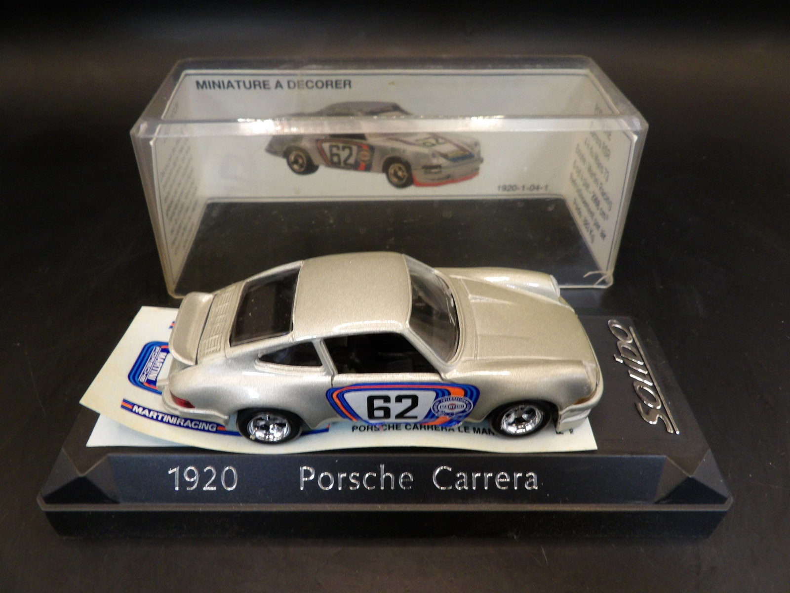 1920 Porsche Carrera Made in France: 3.5 inches length. In a display case. Made in France.