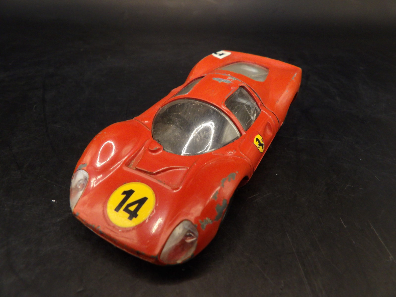 Ferrari 330P3 Made in France: 3.7 inches length. Some paint loss. Back trunk plastic window has crack lines.