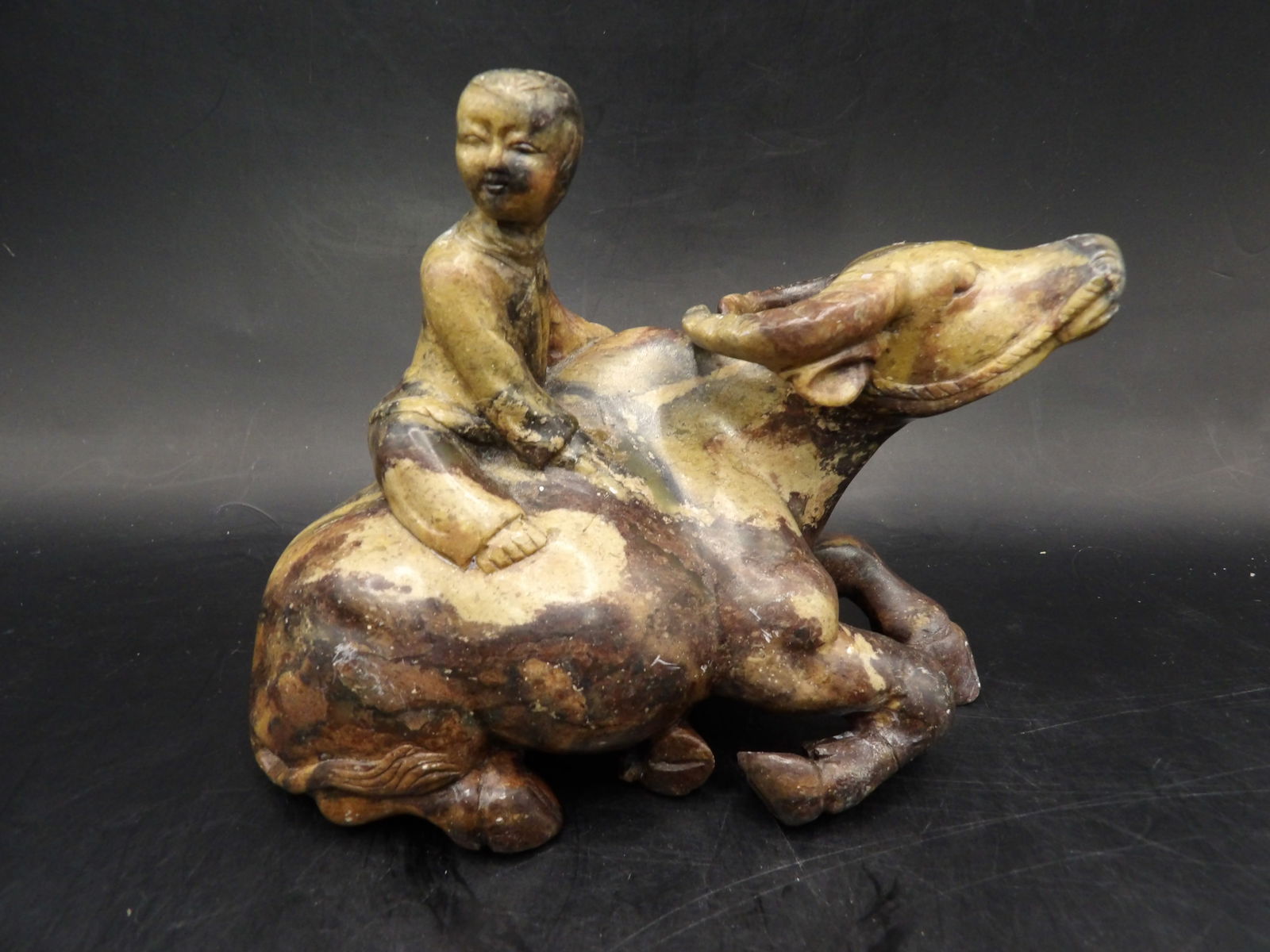 Chinese hard stone carving of a boy riding ox (1 of 5)