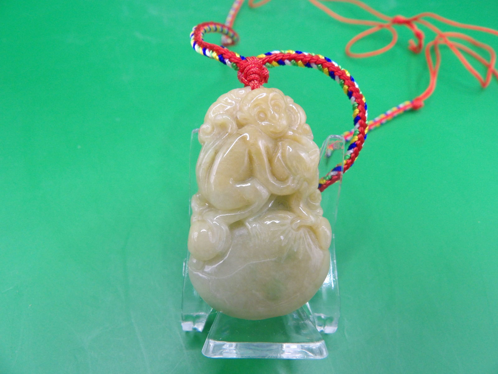 Chinese carved monkey with peach jadeite jade pendant (1 of 5)