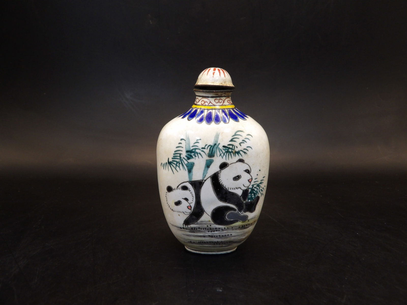 Chinese Qing dynasty Qianlong mark copper enamel painted panda snuff bottle (1 of 6)