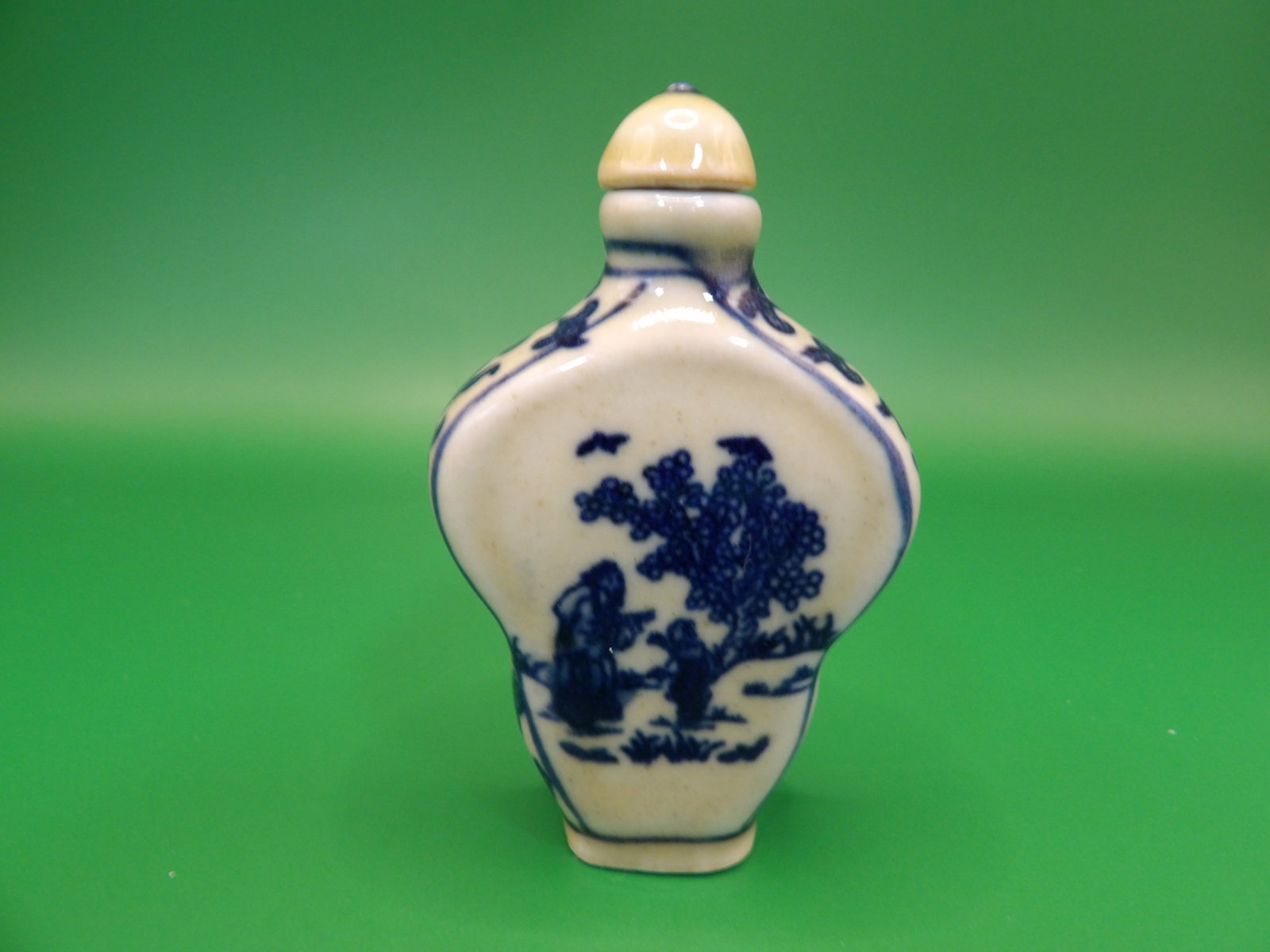 Chinese blue and white porcelain snuff bottle signed on the bottom: 2.6 inches height.