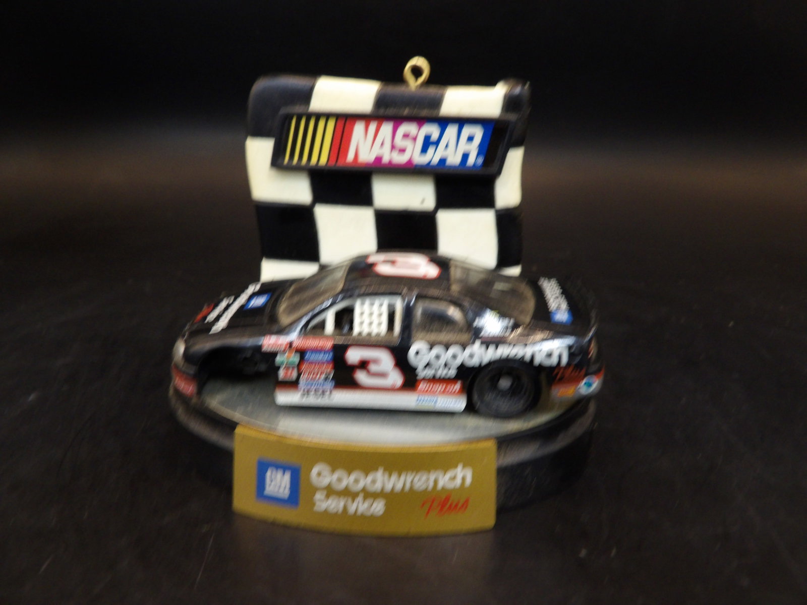 Nascar GM: 3 inches length. Wheel missing is probably due to service scene.