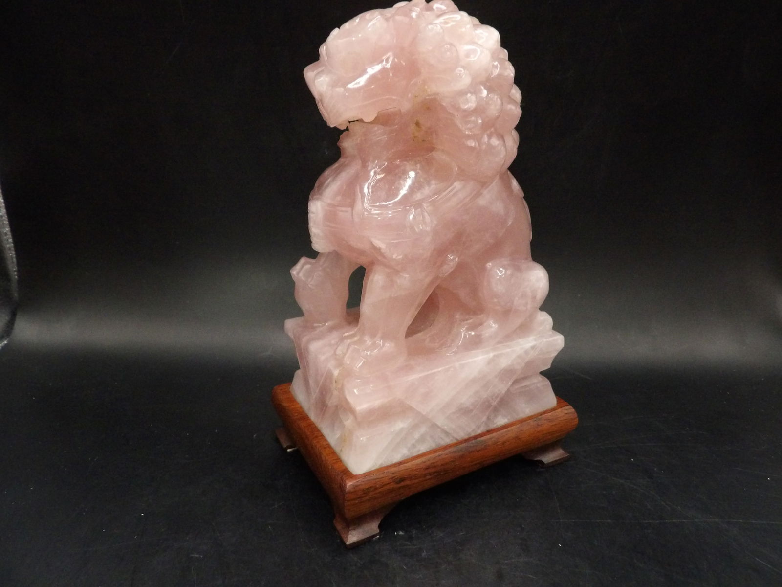 Large Chinese rose quartz carving of guardian lion adhered to wooden base (1 of 5)