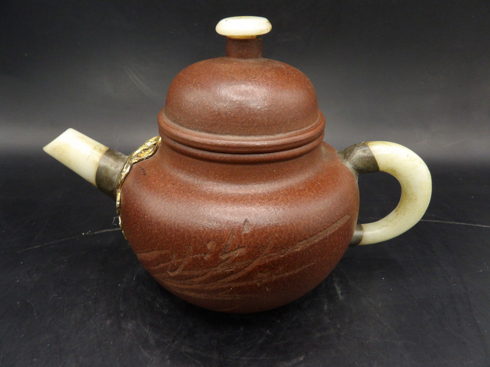 Chinese Yixing teapot with Chinese calligraphy signed: 6 inches length.