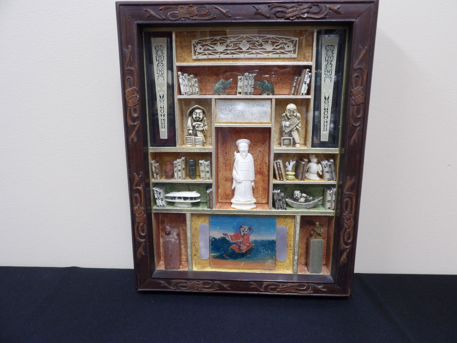 Framed shadow box with Japanese netsuke, Chinese jade and stamp seals (1 of 9)