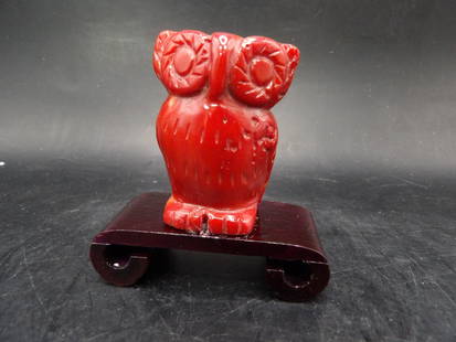 Chinese carved coral owl adhered to wooden base: 2.5 inches height.