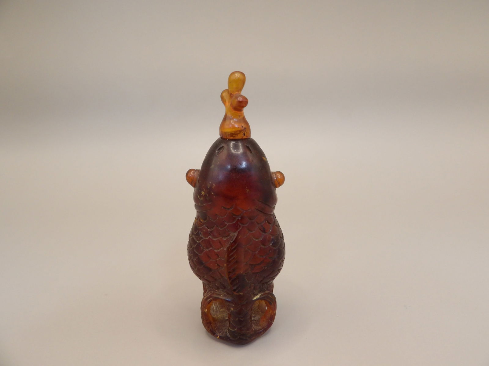 Antique Chinese fish shaped amber snuff bottle (1 of 6)