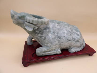 Chinese jade water buffalo statue on wooden base: 7-inch length statue statue is adhered to wooden base. Total weight is 3.9 lbs.