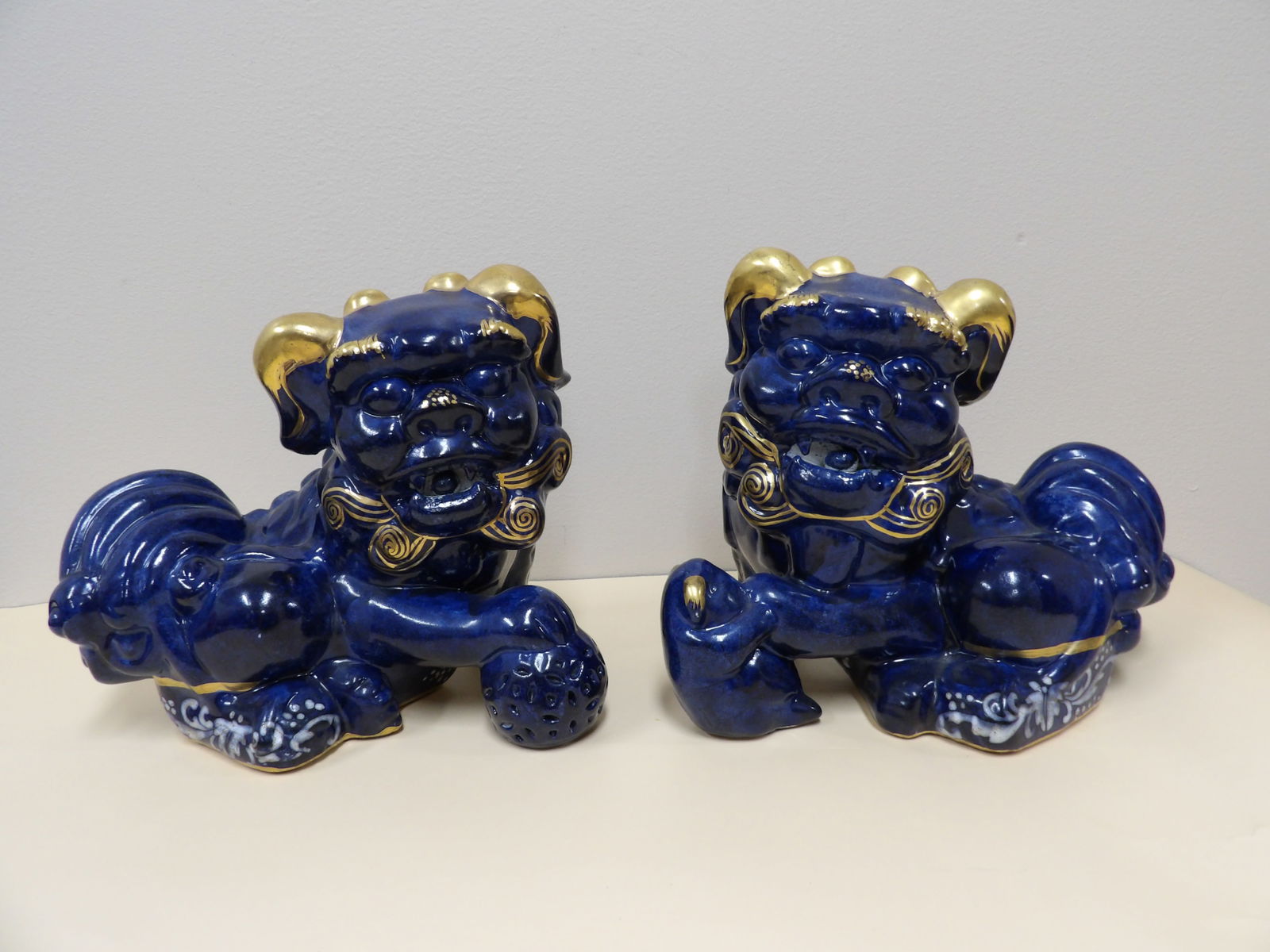 Lot of 2 Chinese blue glazed porcelain foo dog statues with gold gilt (1 of 5)