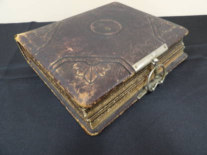 Antique photo album with 54 black and white pictures: Some pages are detached from album frame.