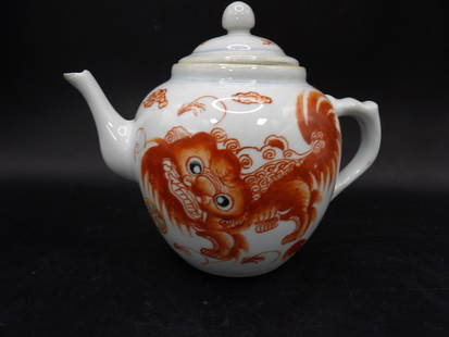Antique Chinese porcelain teapot with hand painted copper red lion signed: 6 inches length.