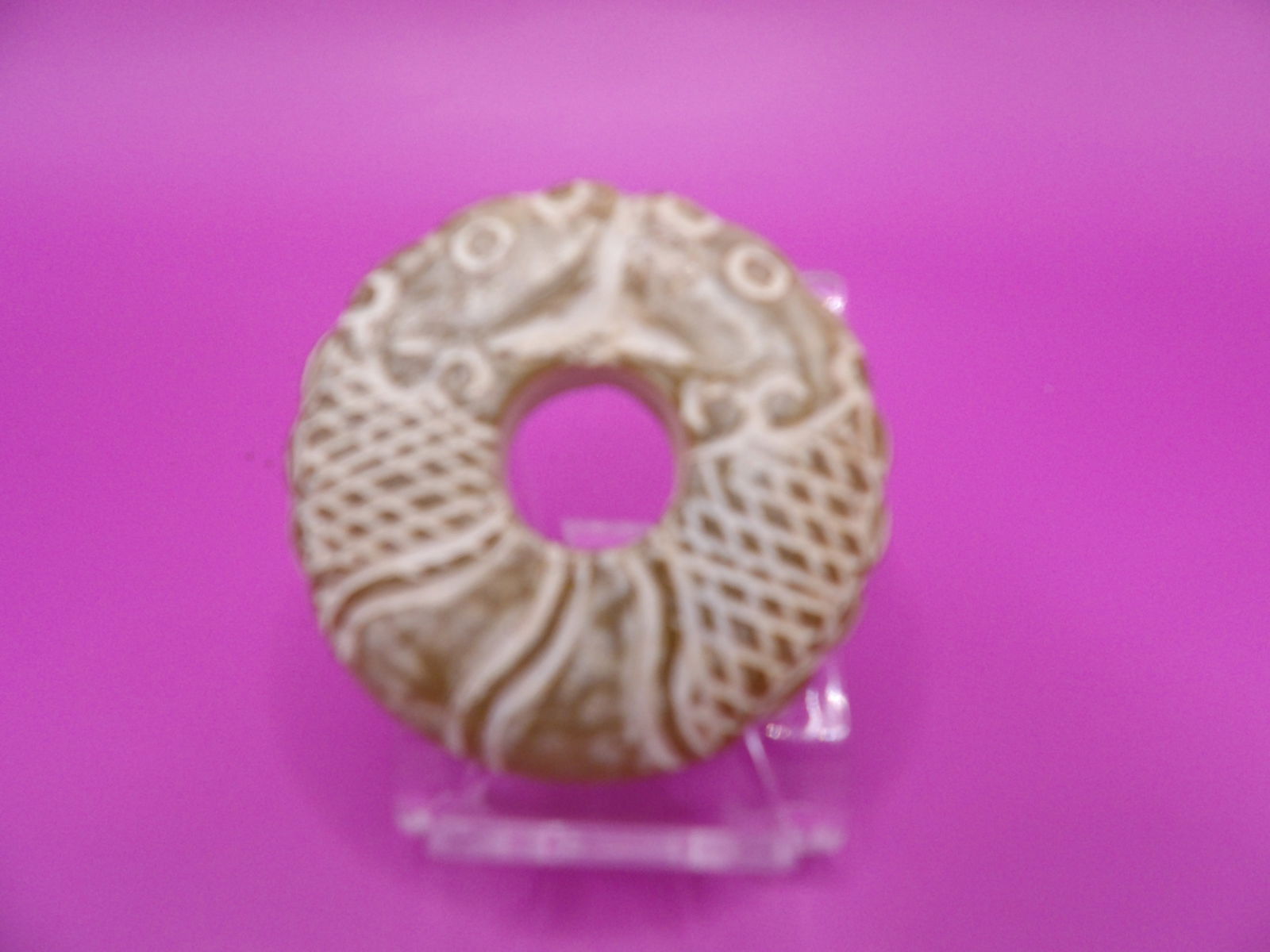 Chinese jade carved double fish Bi: 2.1 inches diameter. 55 grams.