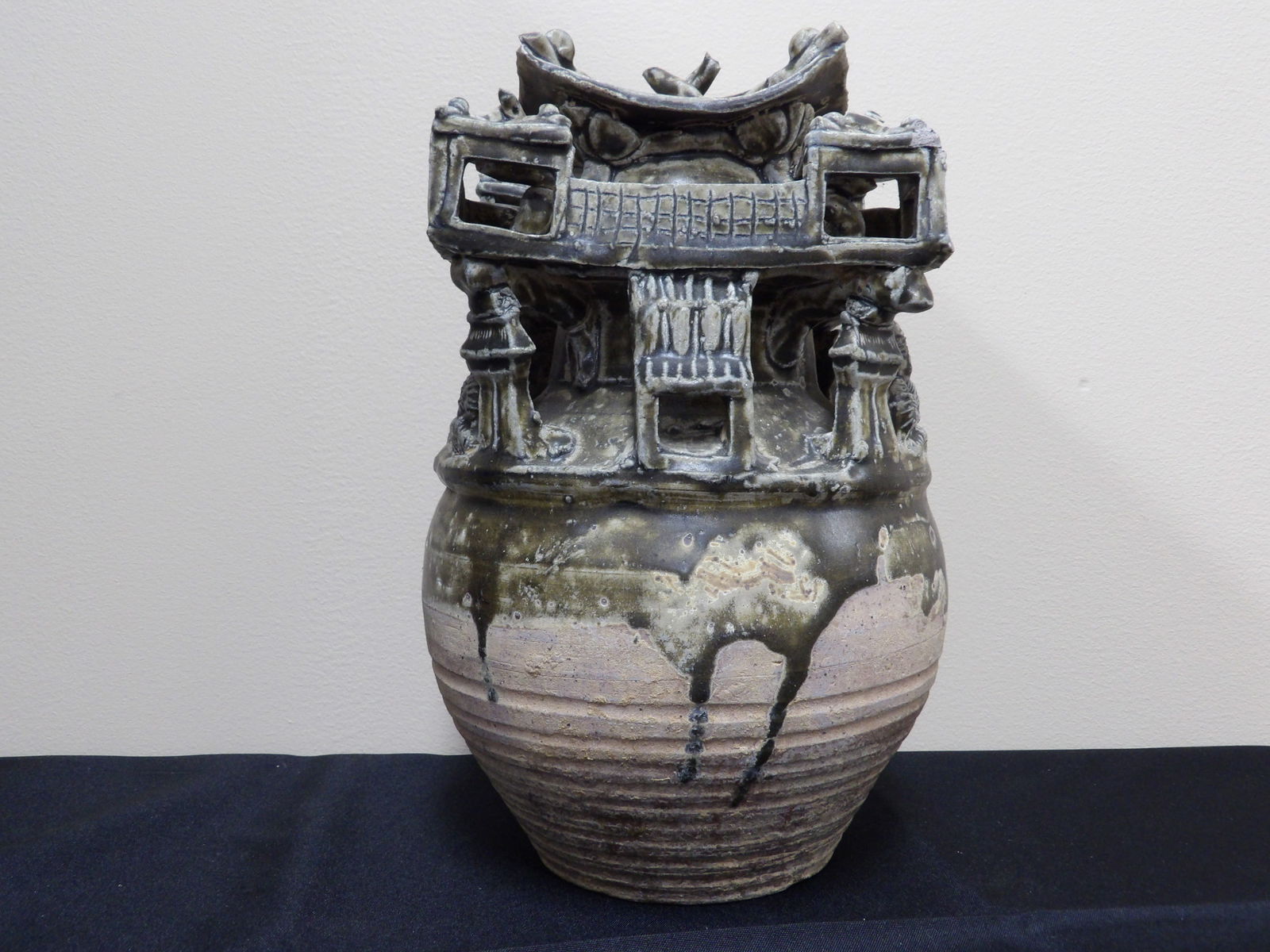 Antique Chinese West Jin Pottery Urn: Over 11 inches height. Small chip on the top of pagoda. Fine details.