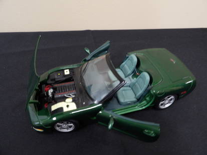Maisto made in Thailand 98 Corvette 1:18: 9.5 inches length.