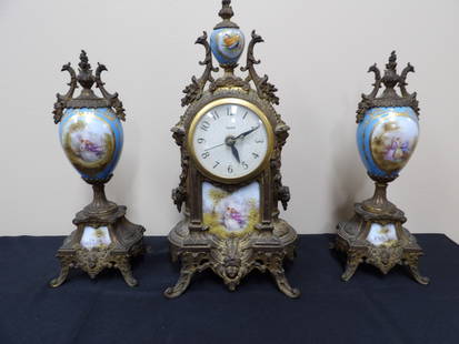 Lot of 3 antique hand painted gold gilt porcelain vases and clock set: Clock is 14.5 inches height. The porcelain and bronze frame of clock are original but the clock may not be the original.Probably French.
