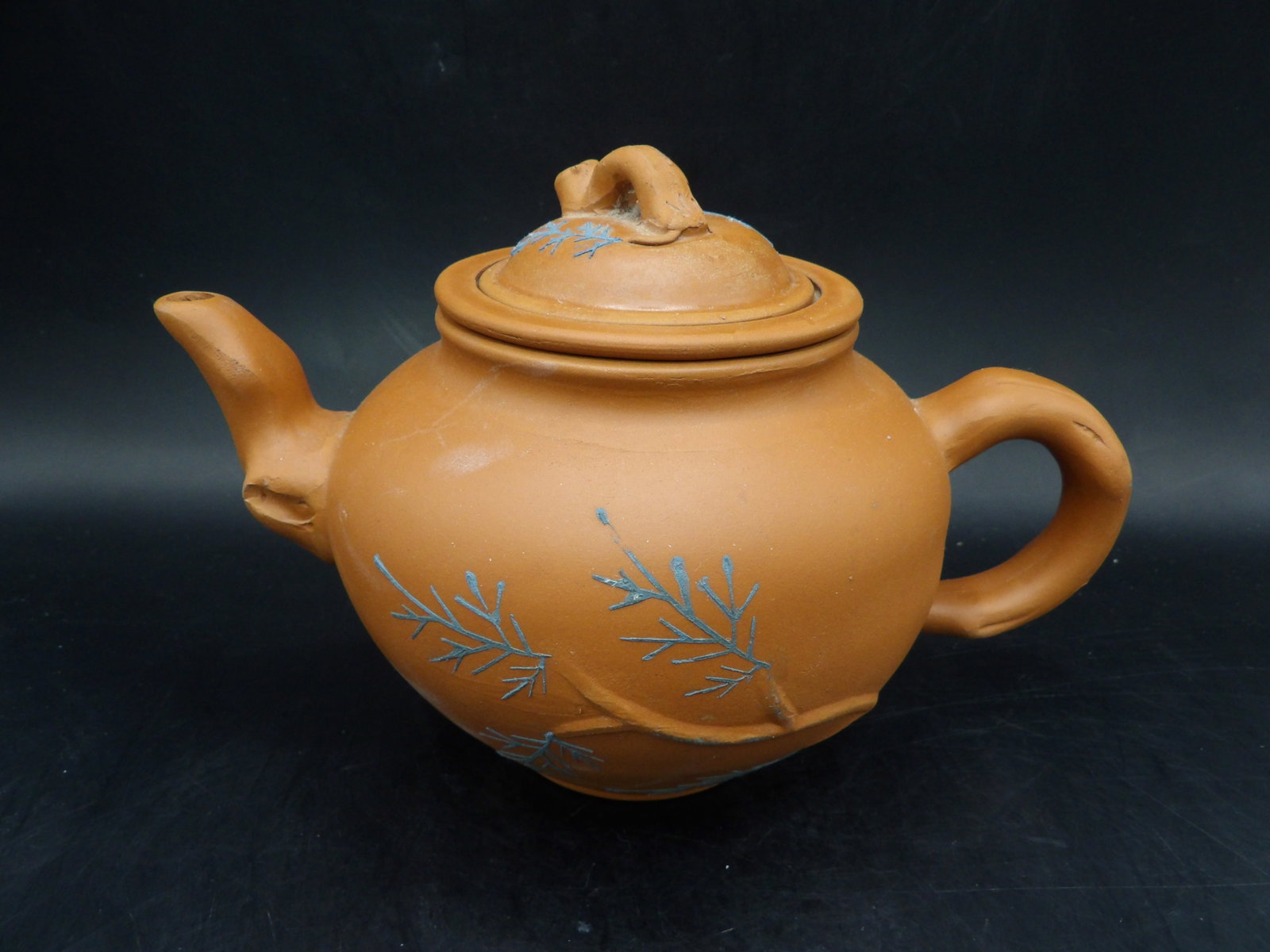 Chinese Yixing teapot with strainer signed on the bottom: 6.5 inches length.