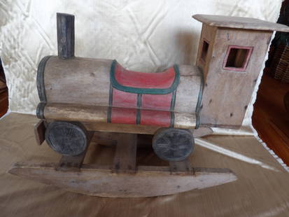 Vintage polychrome train shaped wooden rocker: Size is 25 x 12.5 x 23.5 inches.