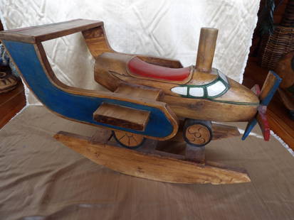 Vintage polychrome airplane shaped wood rocker: Size is 32 x 24.5 x 21 inches.