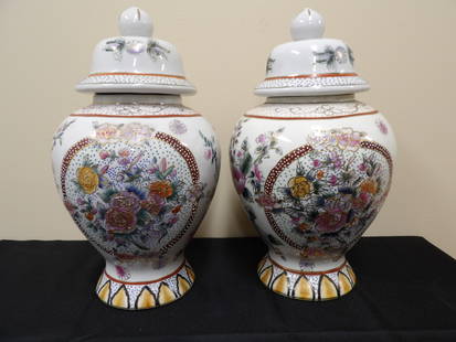lot of 2 Asian style ornate floral pattern porcelain ginger jars: Approx. 14 inches height.