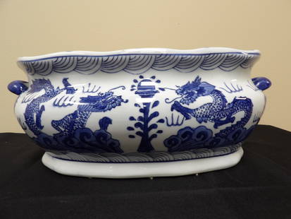 Chinese export porcelain dragon pot jardiniere: 15 inches length.