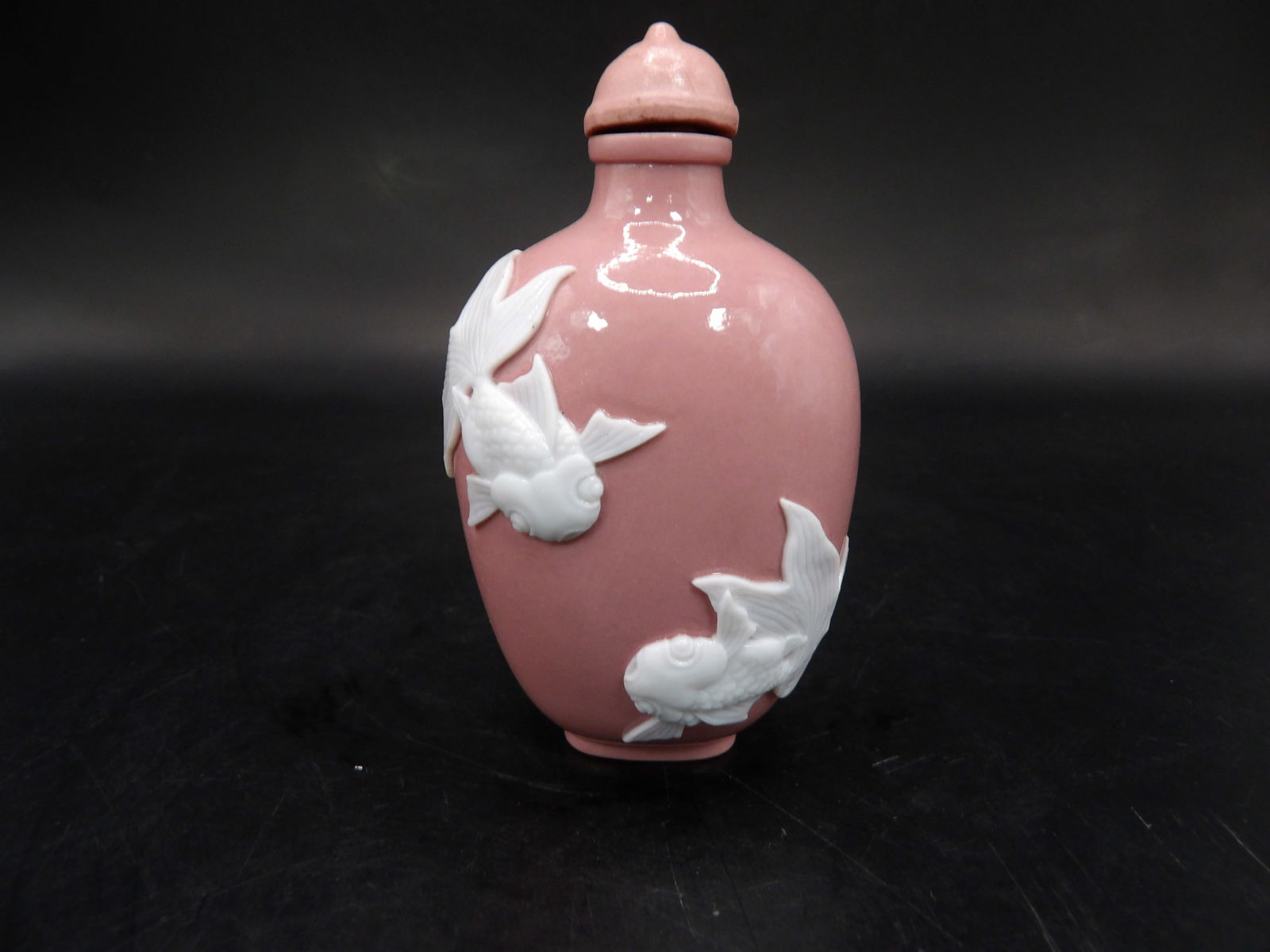 Chinese Qing dynasty Daoguang mark porcelain snuff bottle with raised fish motif: 2.8 inches height.