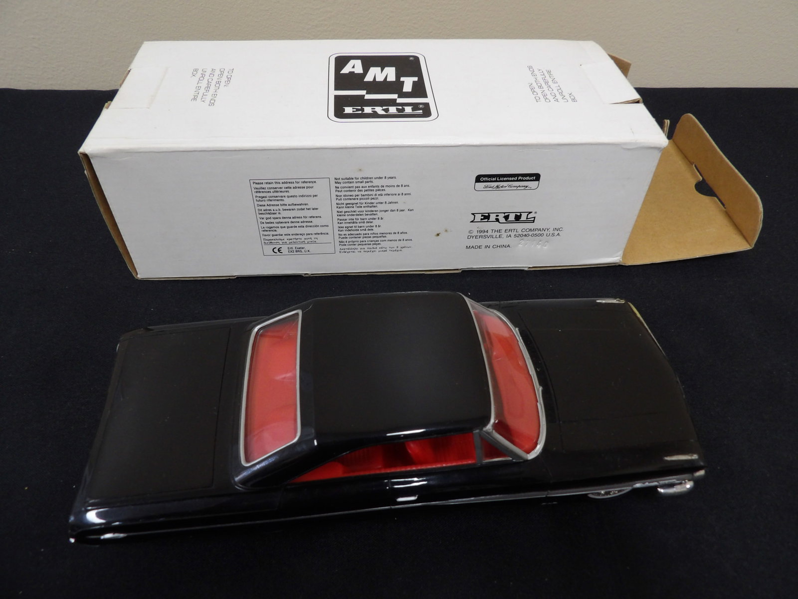 Ertl Company Inc. 1964 Ford Galaxie 500 black with red interior 1:18: 8.2 inches length.