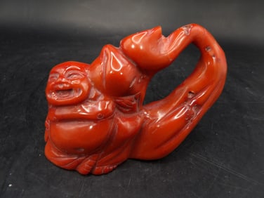 Chinese carved coral buddha holding peach statue