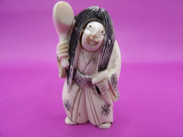 rare antique Japanese netsuke with happy or angry changing faces signed
