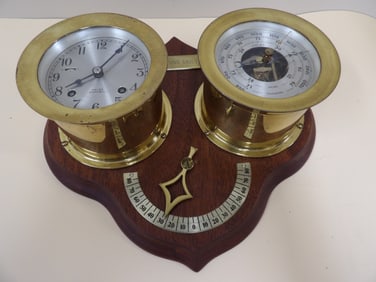 Chelsea ship's bell clock and barometer mounted on wooden base