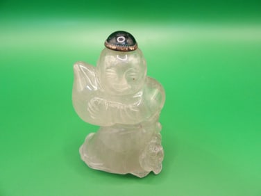 antique Chinese rock crystal boy holding peach snuff bottle with carved bat