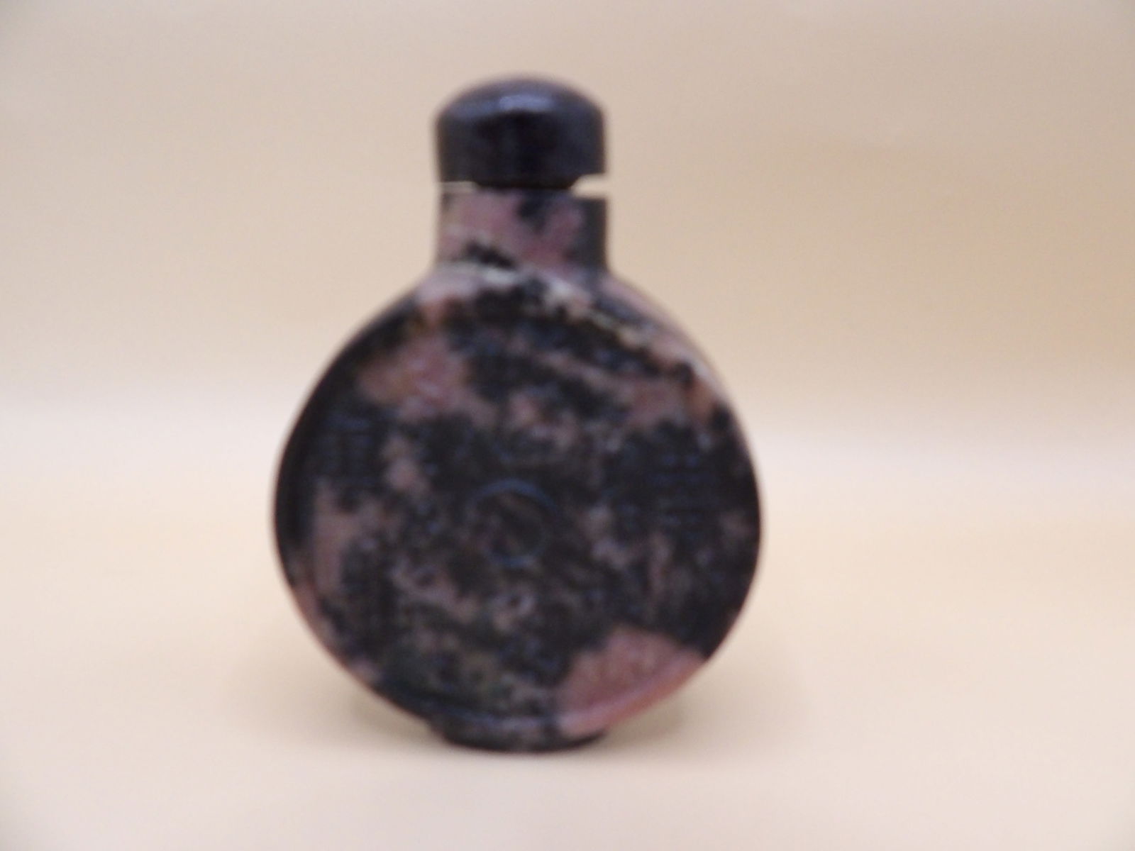 Chinese rhodolite snuff bottle with Chinese zodiac animals and characters: 2.8 inches height.