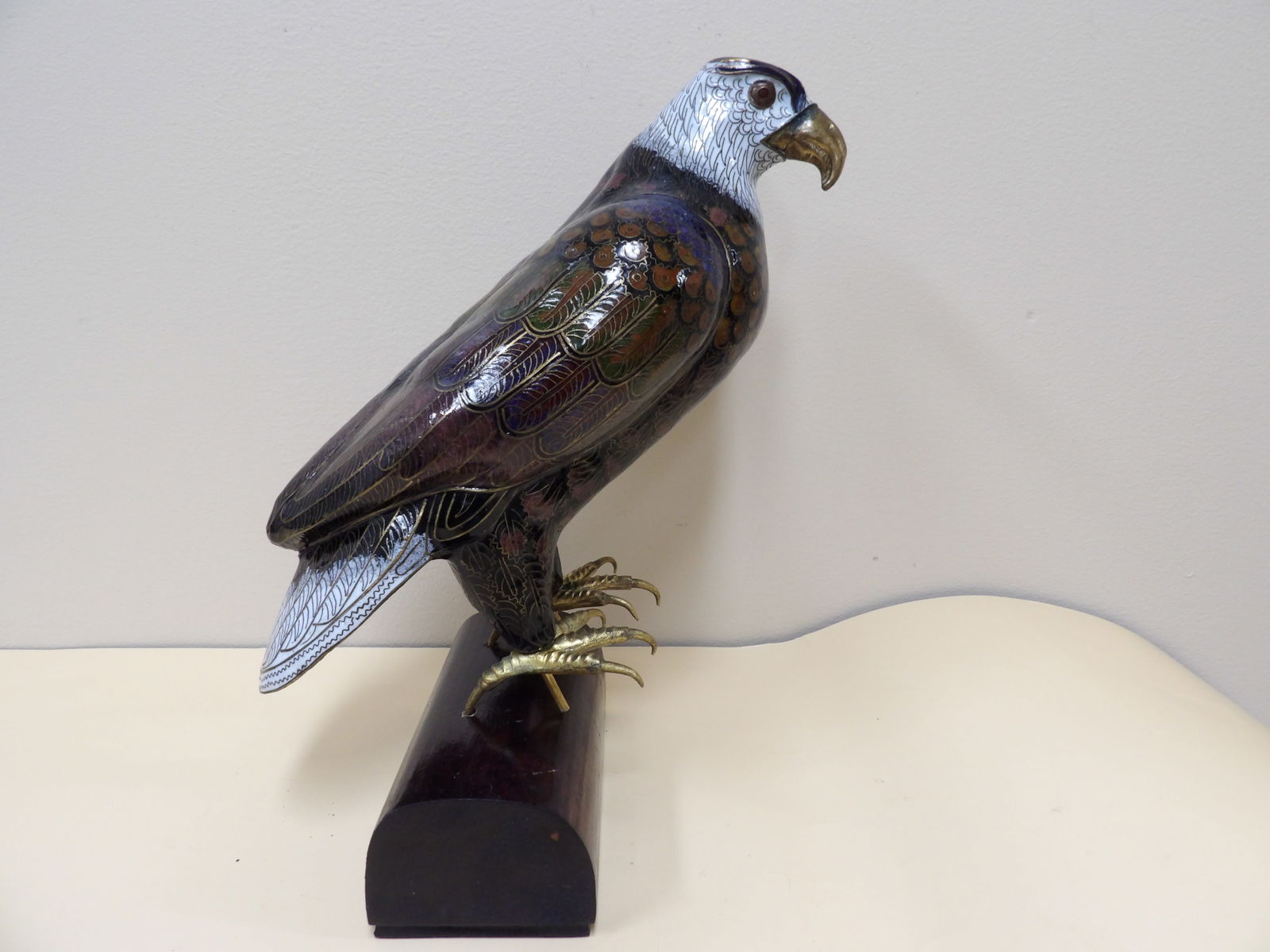 Chinese cloisonne eagle statue on wooden base: 10.5 inches height.