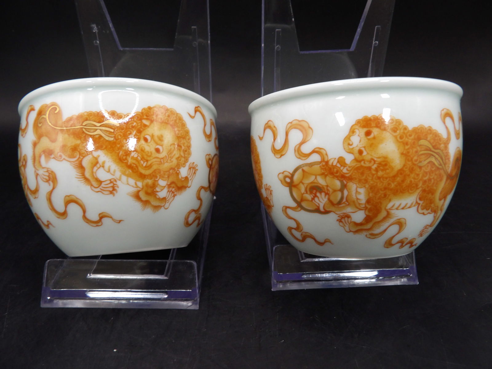Chinese iron red hand painted lion tea cups lot of 2 with Qing dynasty Qianlong mark: 2 inches height.