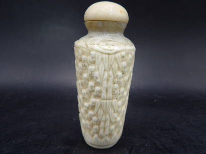 antique Chinese carved bone snuff bottle with many Buddha's faces: 2.8 inches height.
