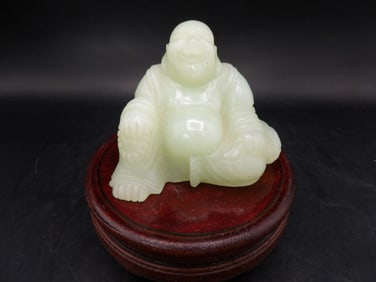 Chinese jade carved buddha statue on wooden base