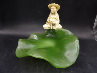 Jade color lotus leaf catchall dish plate with a male Asian figure