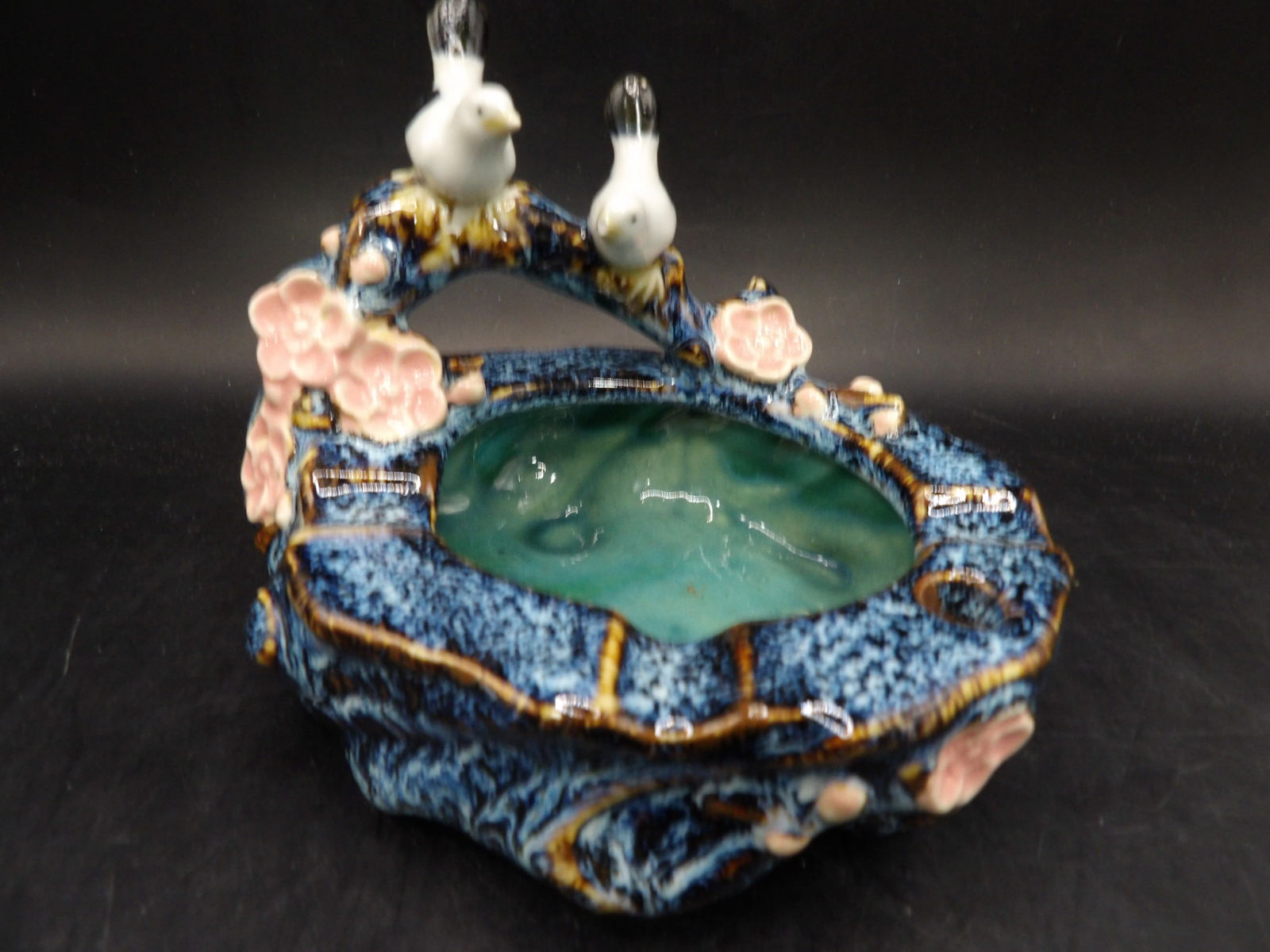 Majolica ceramic ashtray with birds and flowers: 5.5 inches length.