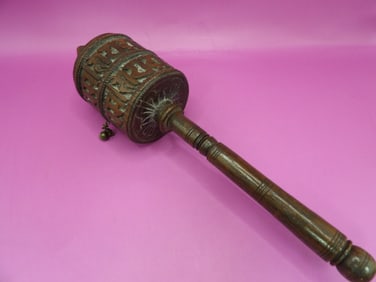 antique Tibetan wooden prayer wheel with carved mantras and bell