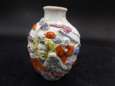 Qing dynasty Chinese molded porcelain 8 immortals snuff bottle with Qianlong mark