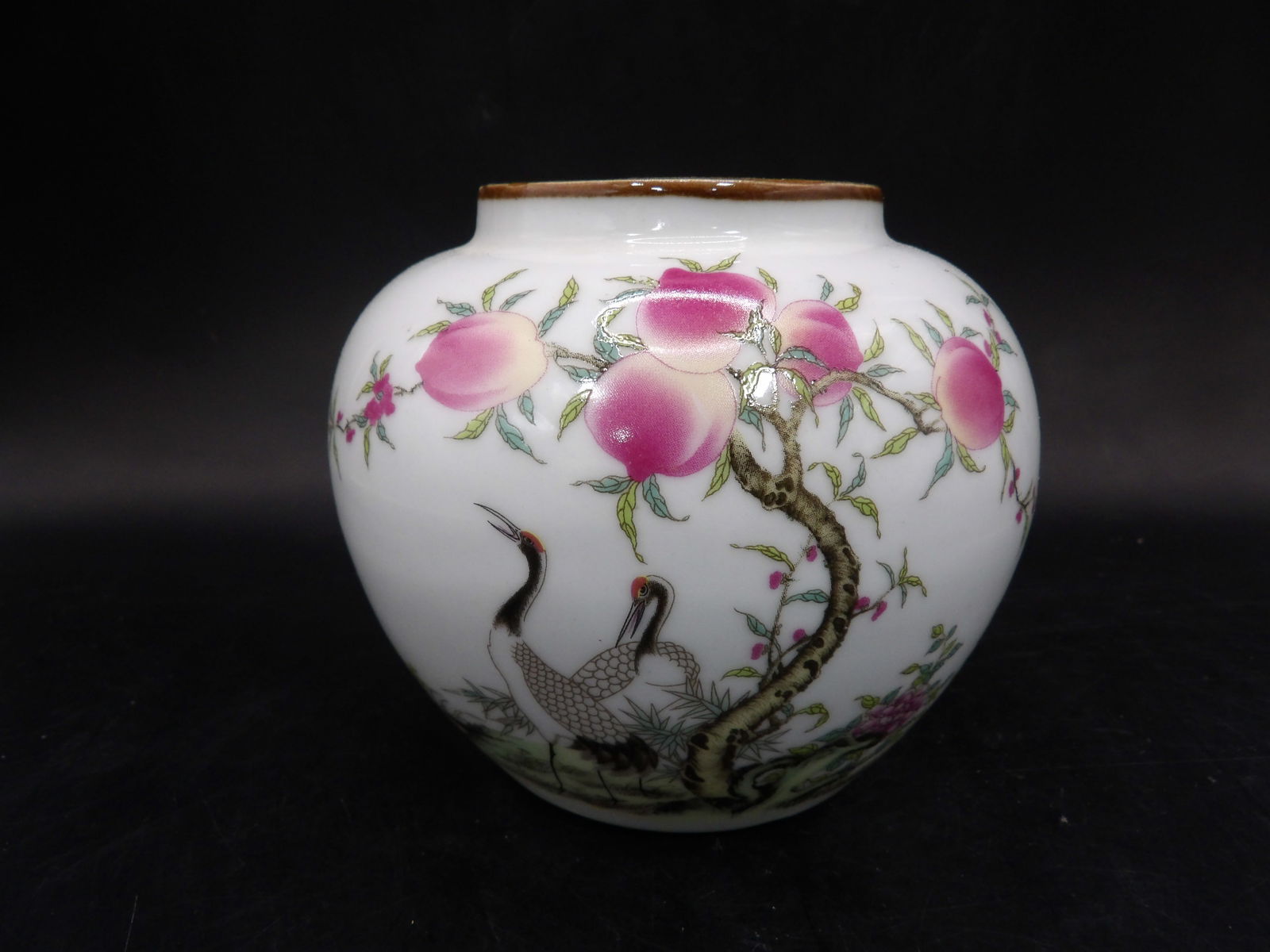 Chinese porcelain brush pot peaches cranes signed on the bottom: 3.5 inches height.