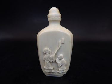 Chinese antique carved natural material snuff bottle with raised motif - No Export