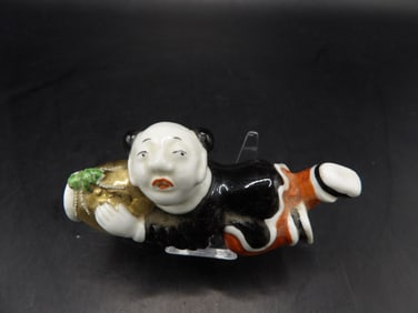 rare Chinese molded porcelain a lying man snuff bottle