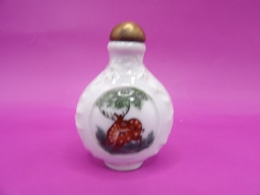 Chinese porcelain snuff bottle with panels of deer motif