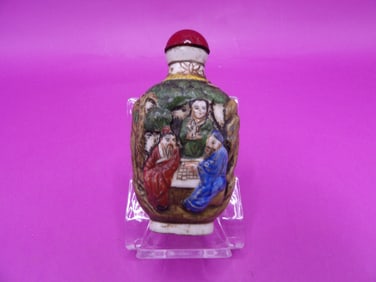 Chinese molded porcelain snuff bottle